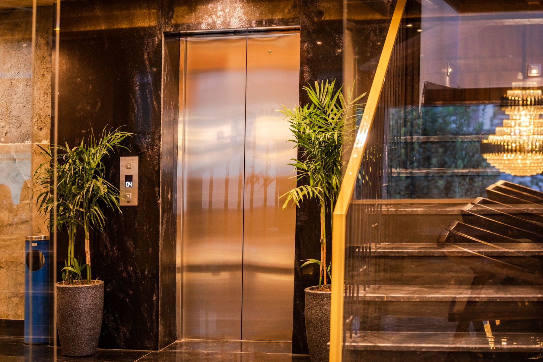 Elevator integrated into a refined hospitality lobby